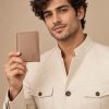 Man holding a genuine leather men's wallet